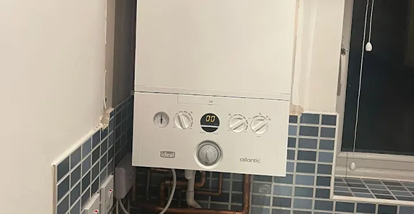 a newly serviced boiler in a kitchen